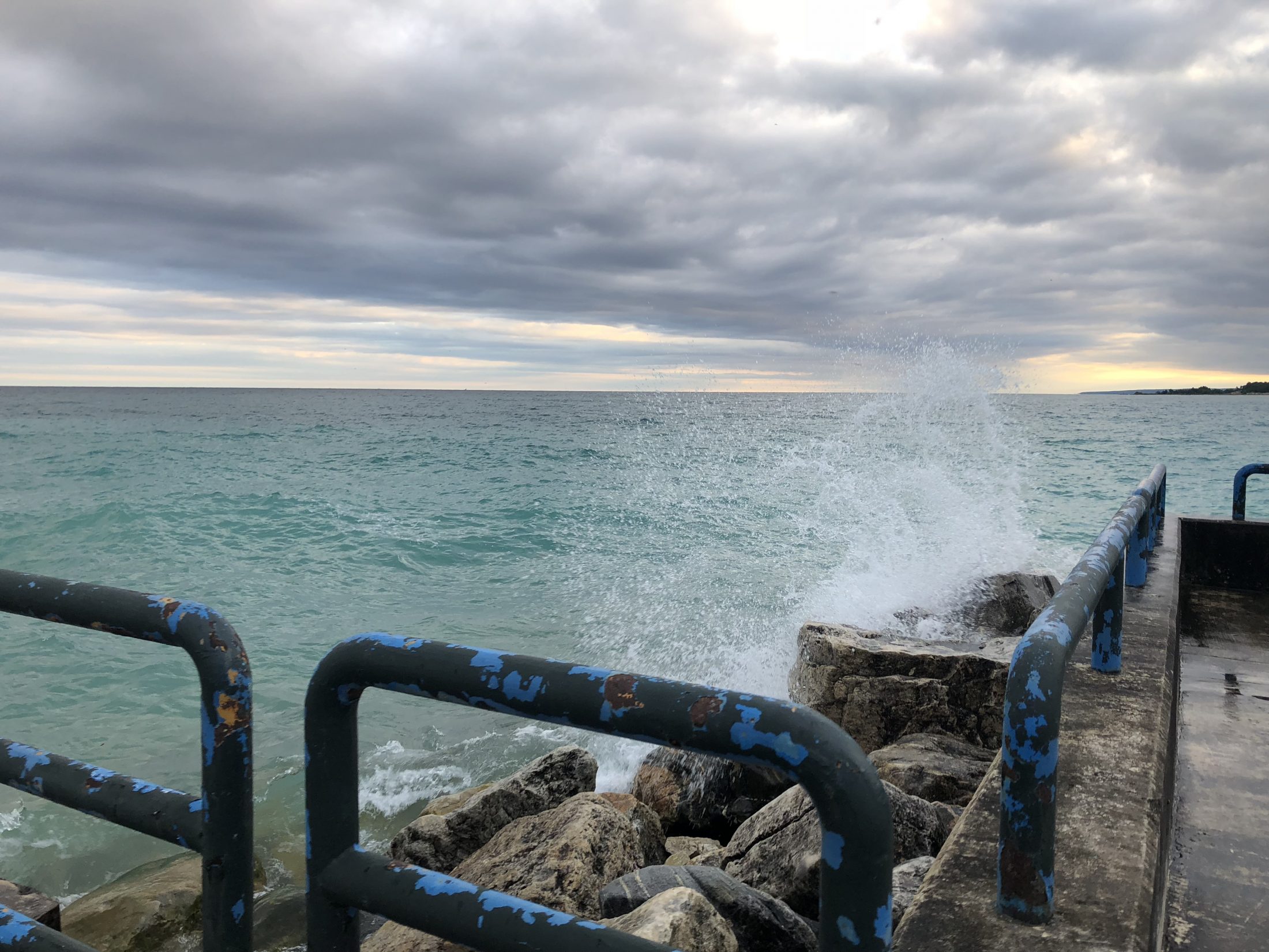 Waves crashing on the pier during Brimley family vacation