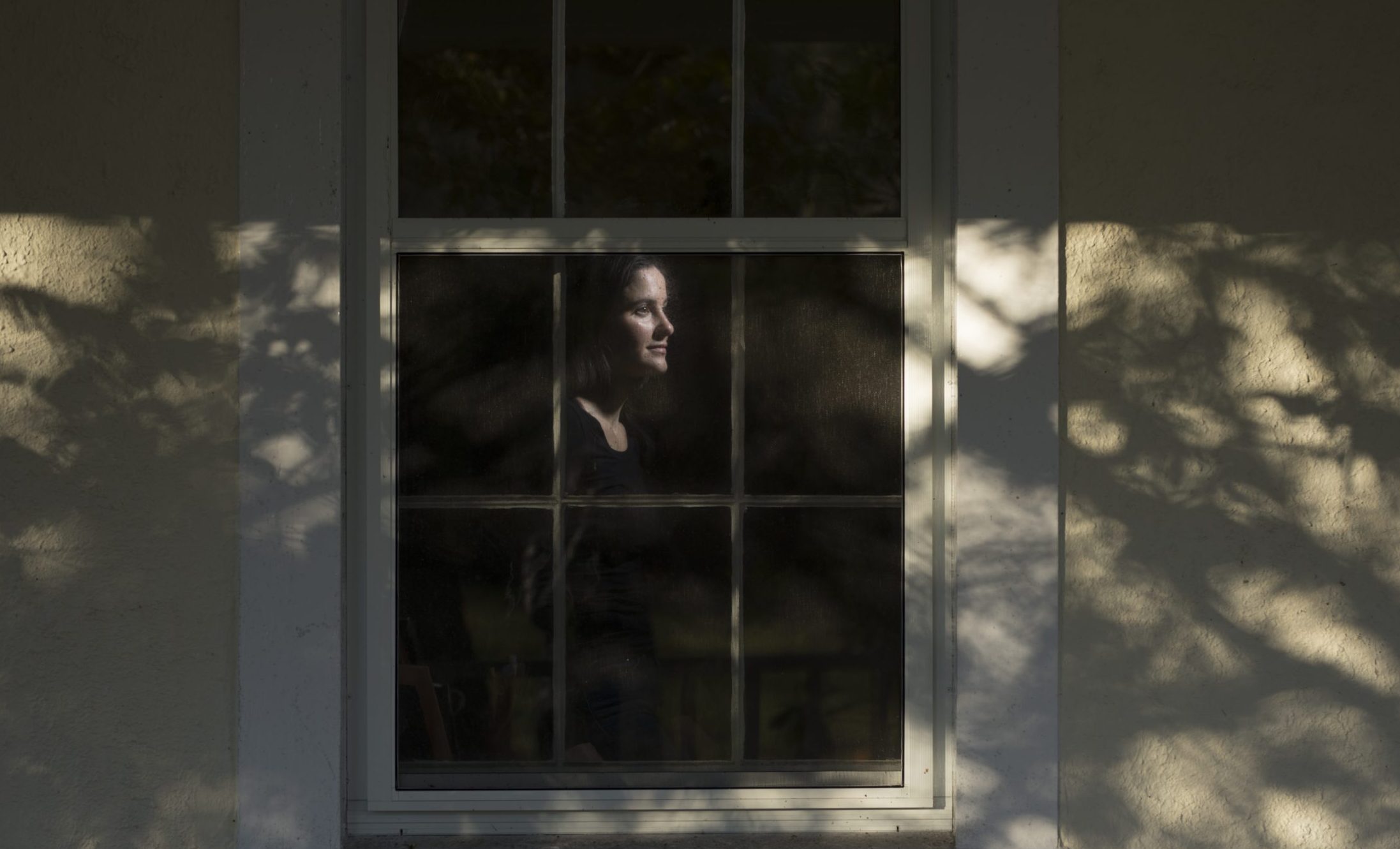 Marjorie Brimley DC Widow in window of farmhouse