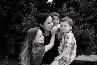 DC widow blog writer Marjorie Brimley holding her three children