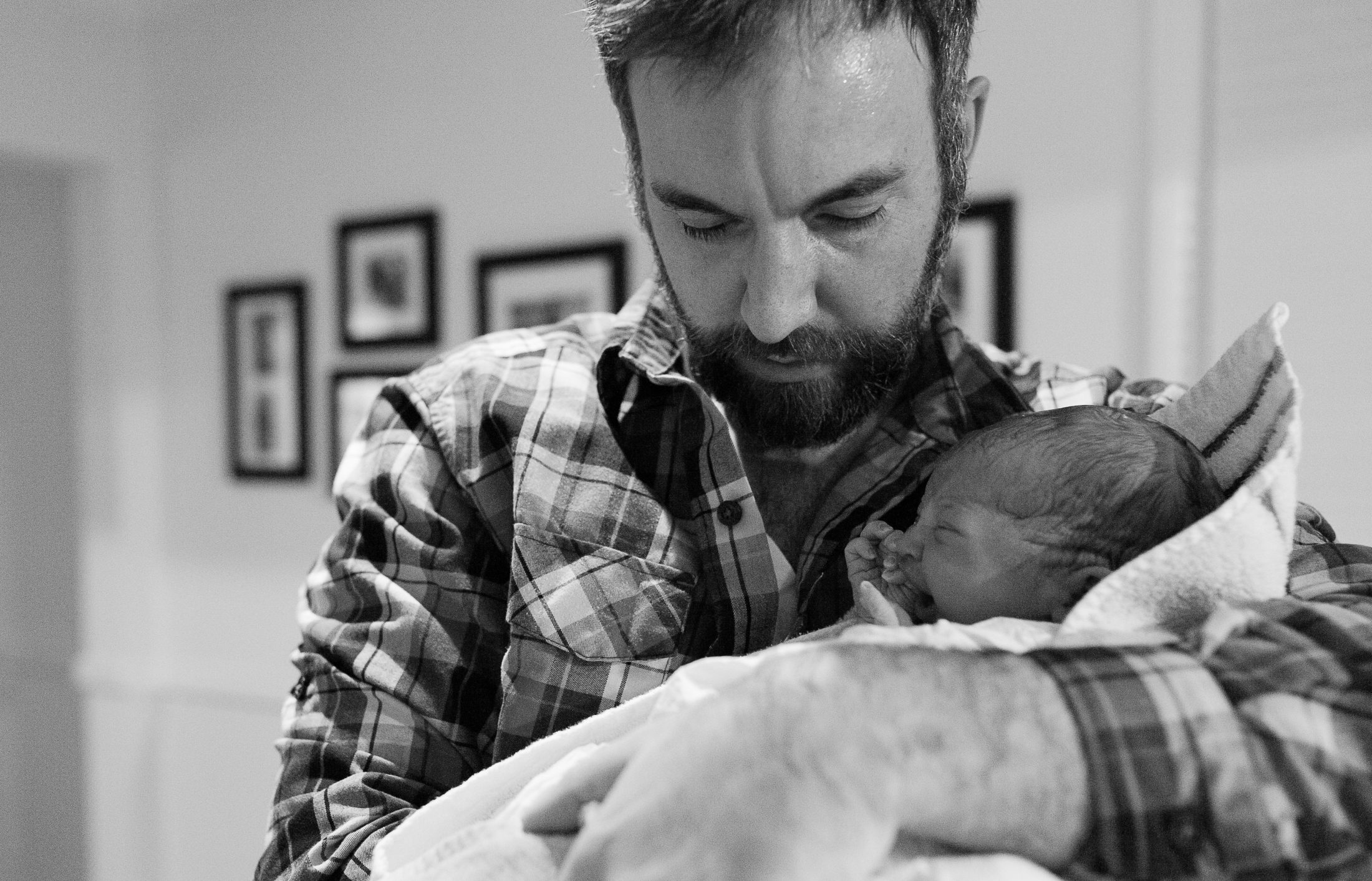 DC widow blog writer Marjorie Brimley's son, Tommy, held by his father, Shawn just after his home birth