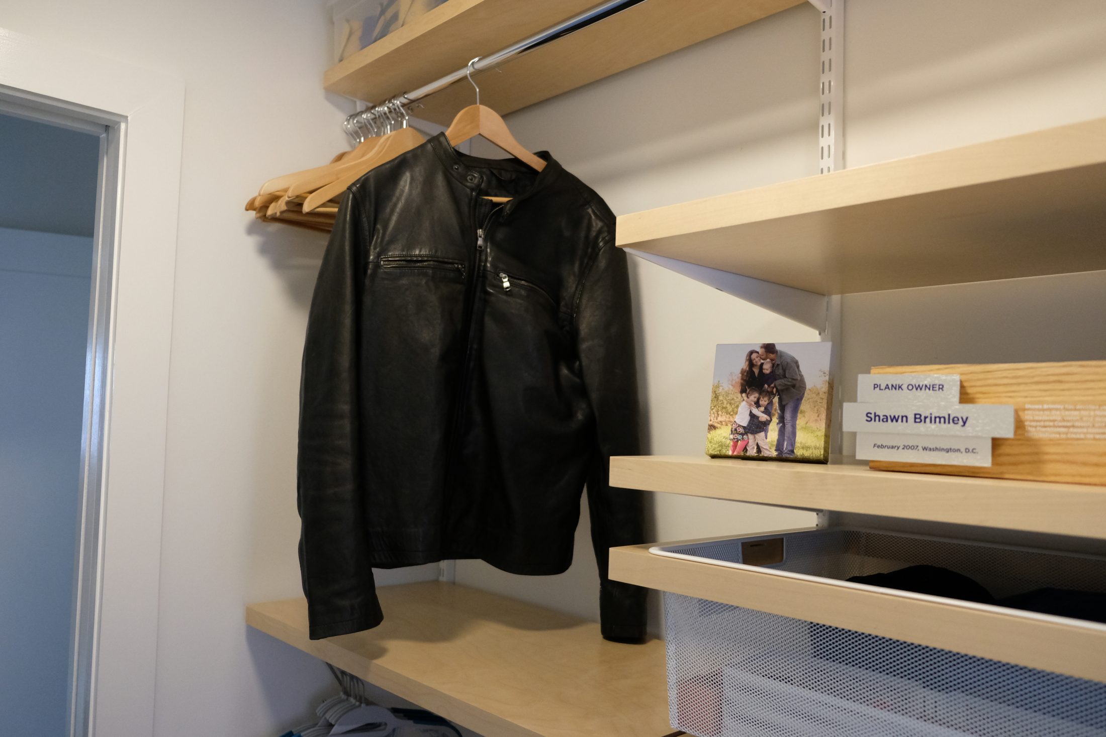 DC widow blog writer Marjorie Brimley's closet with Shawn's leather jacket hanging alone