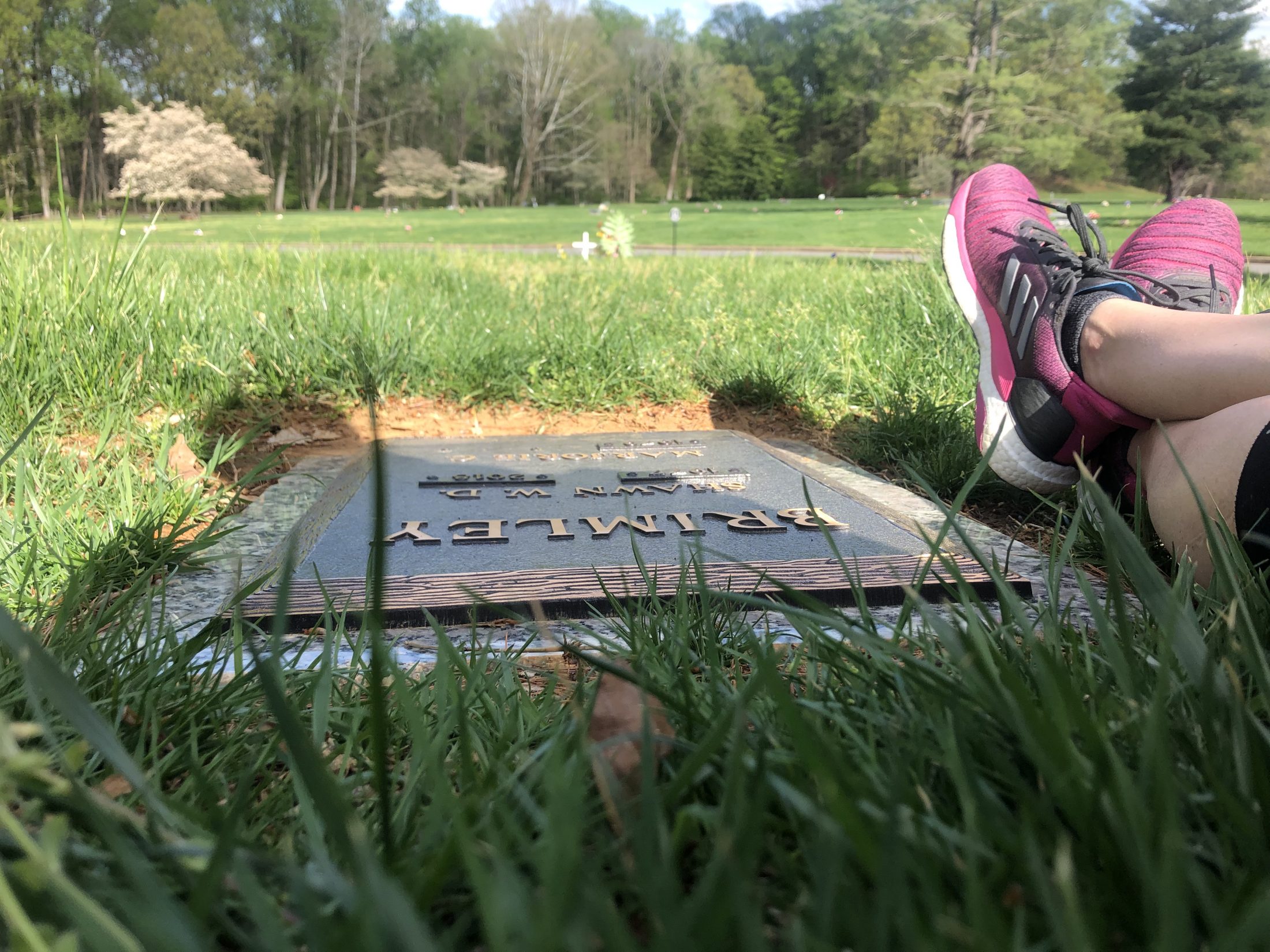 DC widow blog writer Marjorie Brimley's feet at her husband's grave