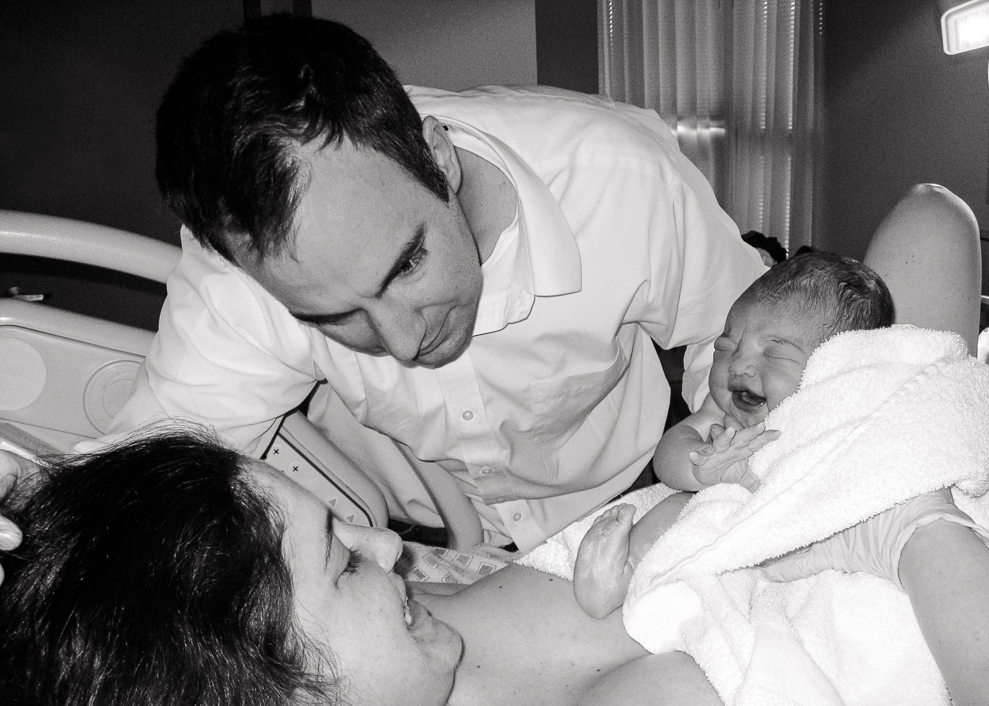 DC widow blog writer Marjorie Brimley with her husband and child on the day she became a mom