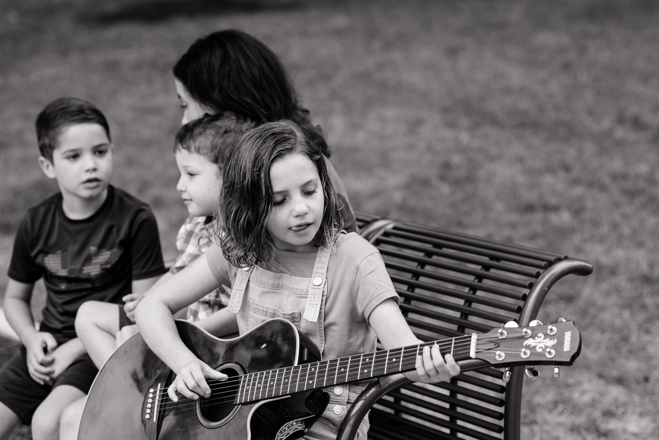 Claire, daughter of DC widow blog writer Marjorie Brimley, plays guitar