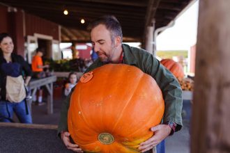Husband of DC widow blog writer Marjorie Brimley lifts massive pumpkin