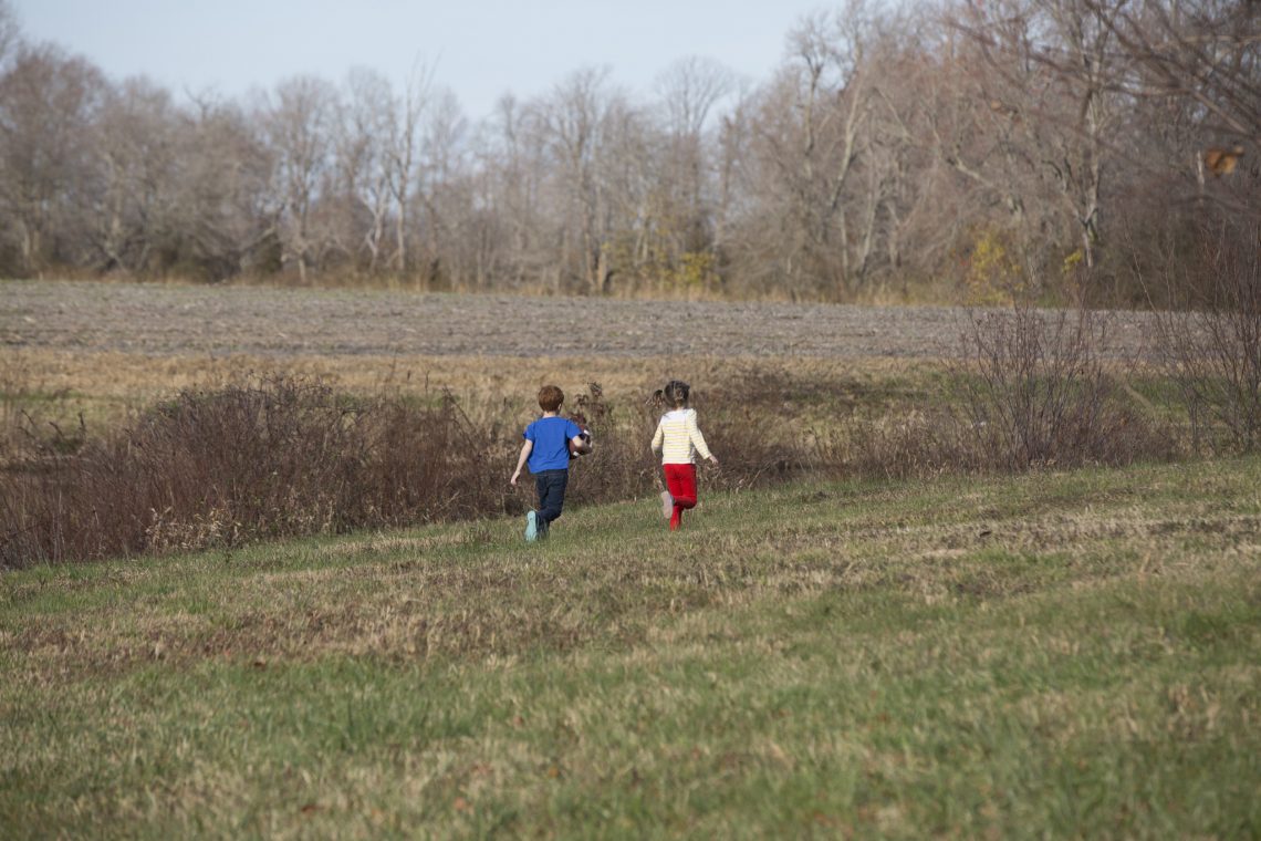 Family children of DC widow blog writer Marjorie Brimley Hale run in field
