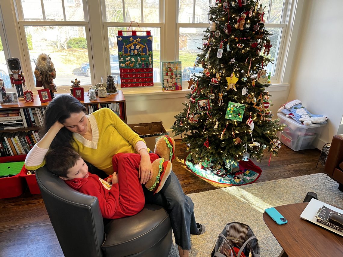 DC widow blog writer Marjorie Brimley with son in front of Christmas tree