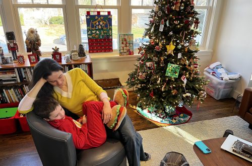DC widow blog writer Marjorie Brimley with son in front of Christmas tree