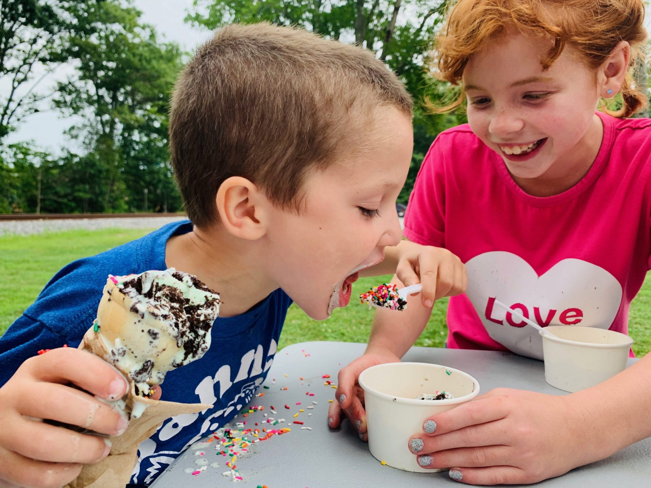 Son of DC widow blog writer Marjorie Brimley eats ice cream with a friend