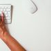 Woman typing at computer for blog by DC widow writer Marjorie Brimley Hale