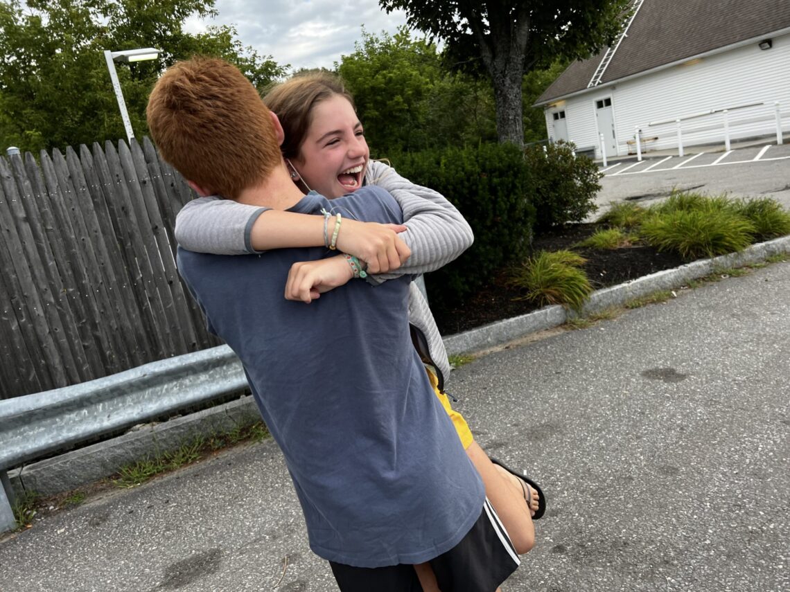 Daughter of DC widow blog writer Marjorie Brimley Hale hugs cousin